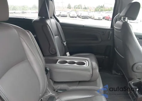 2018 Honda Odyssey Elite z USA, uszkodzony, nr VIN 5FNRL6H97JB025422